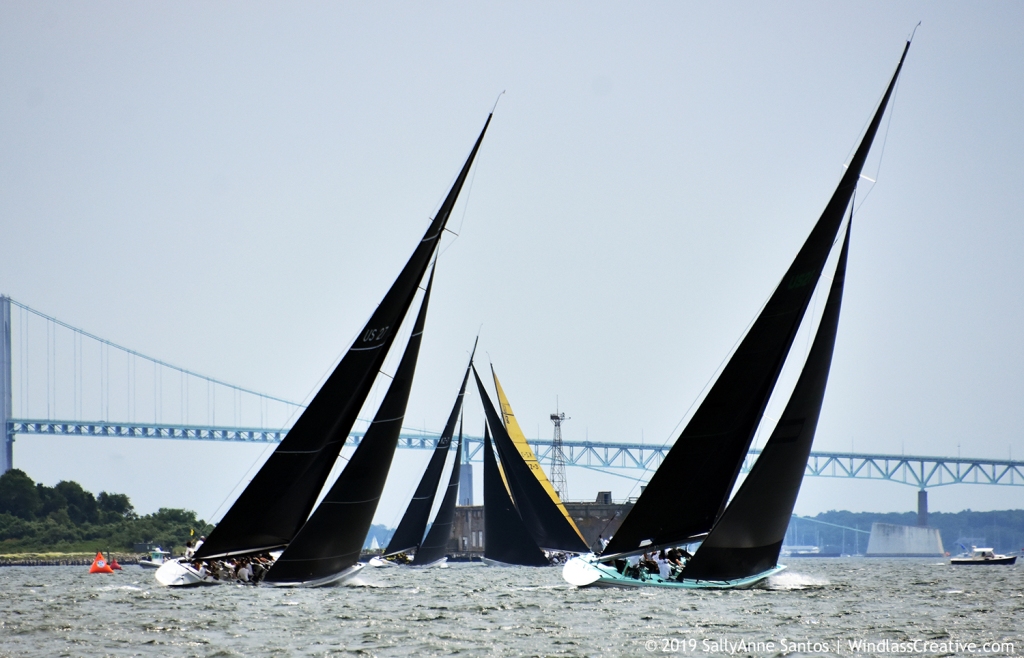 Enterprise (US-27) and Courageous (US-26) chasing the Grand Prix fleet to weather at the 2019 12mR World Championship in Newport, Rhode Island. ~ photo: SallyAnne Santos